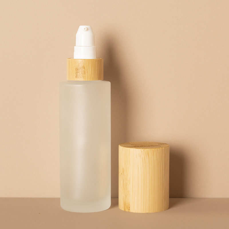 Nagyelo na cosmetic lotion pump fine mist at lotion glass spray bote na may takip na kahoy na kawayan Nagyelo na cosmetic lotion pump fine mist at lotion glass spray bote na may takip na kahoy na kawayan