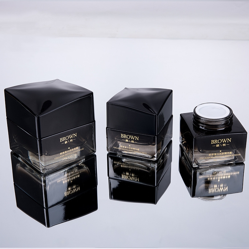 Natatanging square glass cream jar na may nakataas na disenyo ng takip para sa kosmetiko packaging Natatanging square glass cream jar na may nakataas na disenyo ng takip para sa kosmetiko packaging