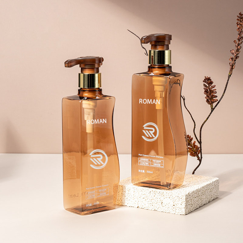 Maaasahang 350ml 500ml curve-shaped amber pet plastic walang laman na bote ng lotion na may bote na may bomba para sa pangangalaga ng shampoo conditioner o paggamit ng face cream