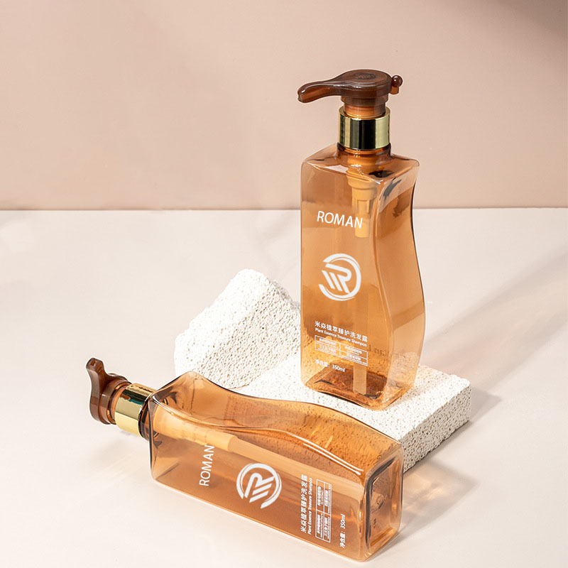 Maaasahang 350ml 500ml curve-shaped amber pet plastic walang laman na bote ng lotion na may bote na may bomba para sa pangangalaga ng shampoo conditioner o paggamit ng face cream Maaasahang 350ml 500ml curve-shaped amber pet plastic walang laman na bote ng lotion na may bote na may bomba para sa pangangalaga ng shampoo conditioner o paggamit ng face cream